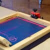 Stampare con telaio serigrafico con pinza